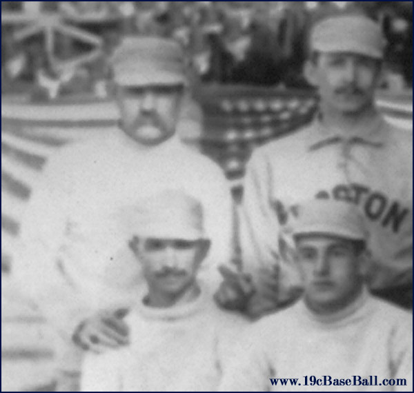 Detail from 1886 Boston/New York team photo. The only pitcher in the history of major league baseball to win 60 games in a single season, Charles “Old Hoss” Radbourn extends his middle finger towards the camera. Photo Credit: 19th Century Baseball