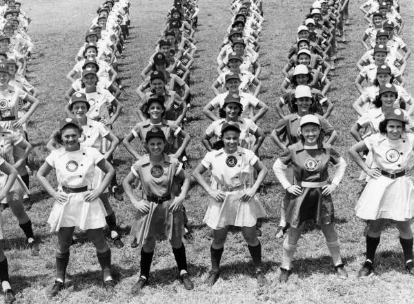 League members performing calisthenics in Opalocka, Florida, April 22, 1948. The different baseball clubs are (L-R): Fort Wayne Daisies (partially visible), Chicago Colleens, Rockford Peaches, South Bend Blue Sox, Springfield Sallies and Peoria Redwings. Photo Credit: Florida Memory