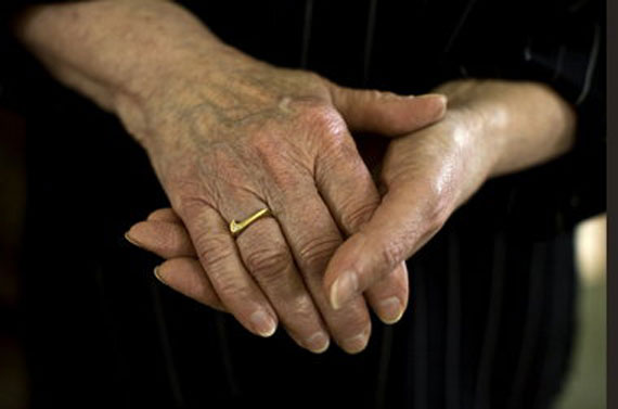 Carolyn Davidson was presented with a gold and diamond ring -- and some Nike stock -- during a 1983 event in her honor. "I never get tired of looking at it," she says of The Swoosh. Photo Credit: Motoya Nakamura/The Oregonian Carolyn Davidson was presented with a gold and diamond ring -- and some Nike stock -- during a 1983 event in her honor. "I never get tired of looking at it," she says of The Swoosh. Photo Credit: Motoya Nakamura/The Oregonian