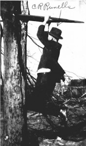 Gentleman hanging from a piece of wood that was hurled into a tree by the tornado. Photo Credit: Jackson County Historical Society/NOAA