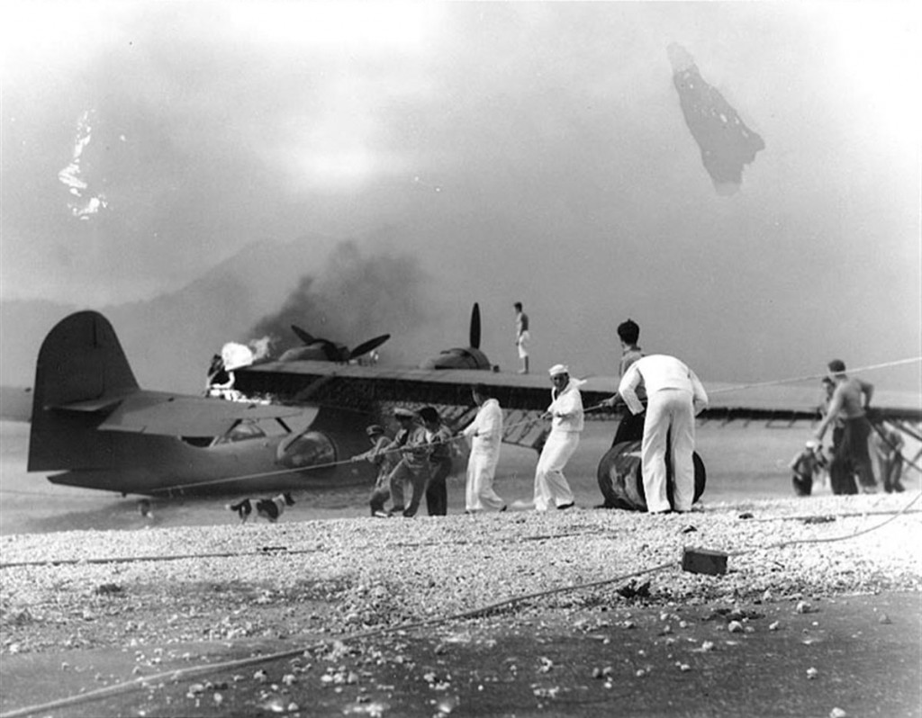 Attempting to save a burning PBY at NAS Baneohe Bay after Japanese Raid, December 7, 1941. 
