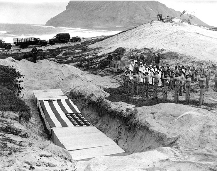 Burial ceremonies for men killed at NAS Kanoehe Bay during the Japanese raid