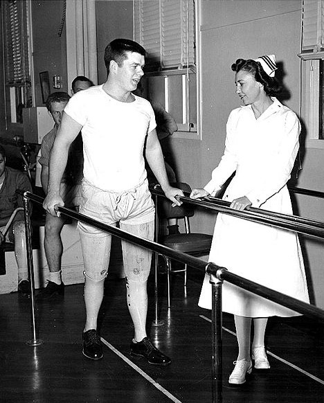 Lt. Sarah Griffin Assisting Injured Veteran, 1951