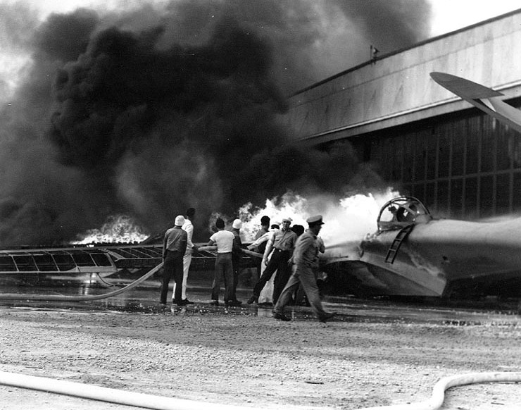 PBY patrol bomber burning at Naval Air Station Kaneohe, Oahu, during the Japanese attack.
